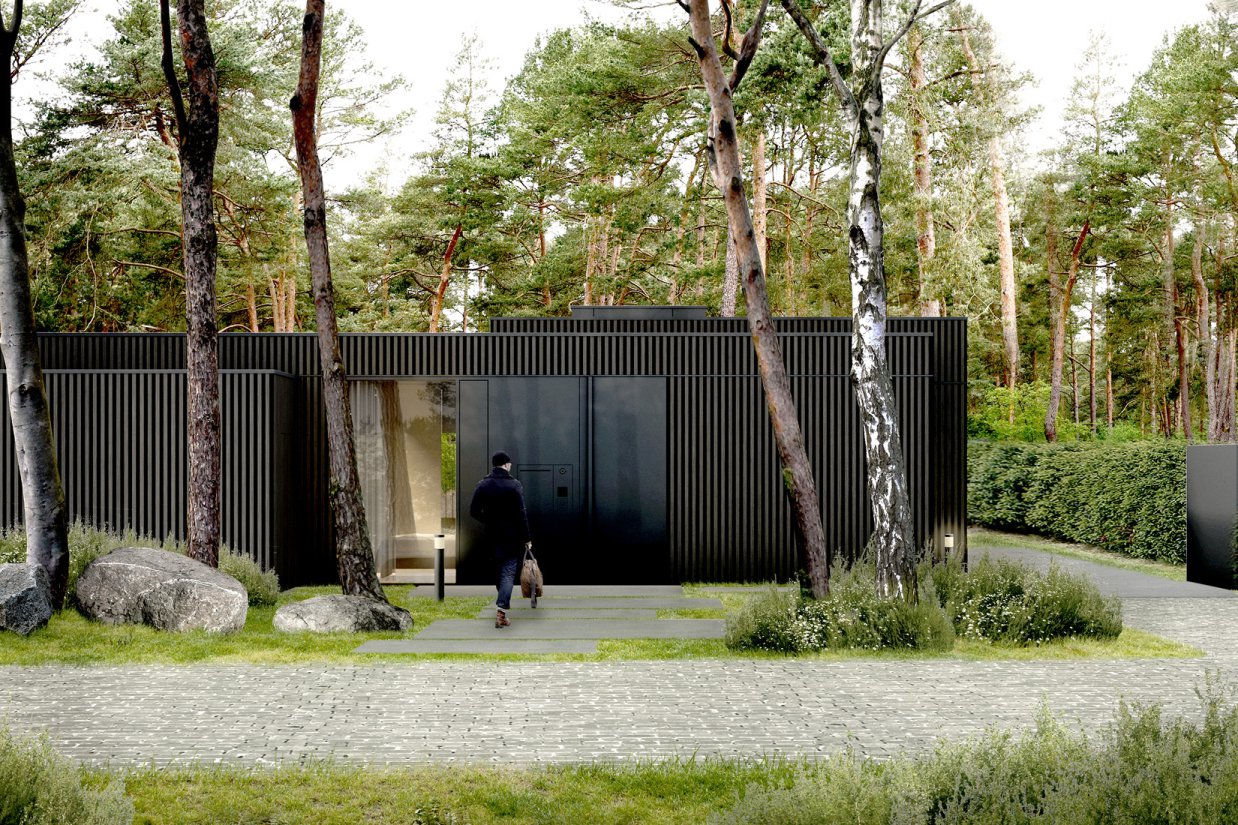 Minimalistisches Ferienhaus am Dass mit vorvergrauter Holzfassade aus Lärche und schwarzen Metallelementen von Bonauer Bölling Architekten, Berlin